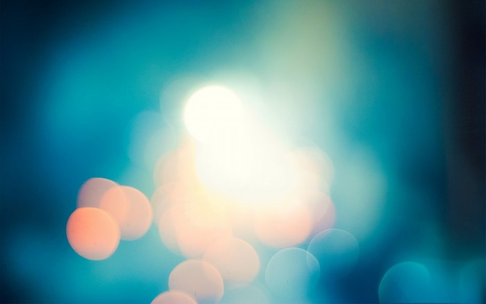 Abstract bokeh lights with blue and orange hues