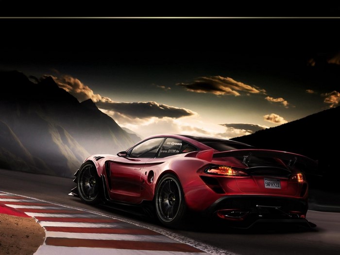 Red McLaren Sports Car on Race Track