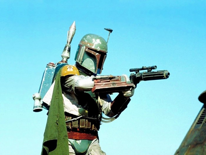 Boba Fett from Star Wars holding a blaster rifle