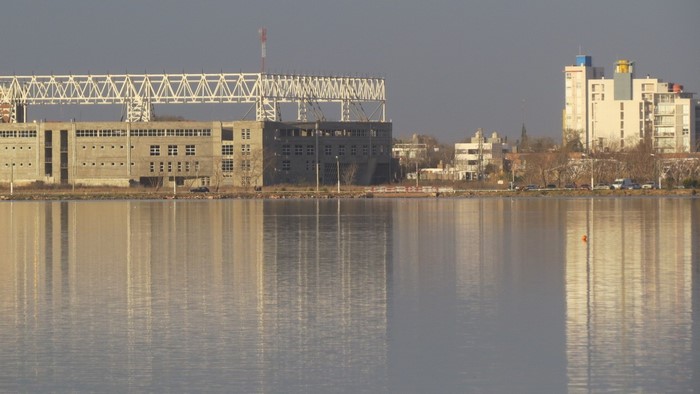 Cityscape with buildings and water reflection