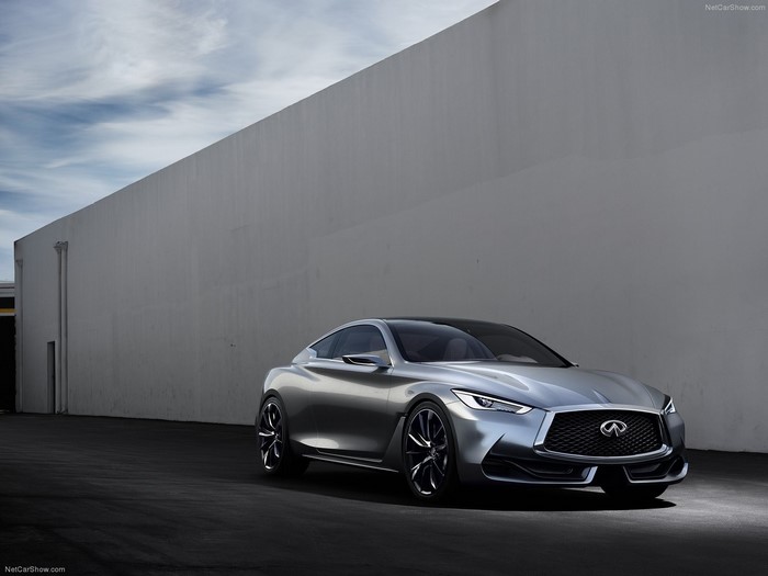 Silver Infiniti Q60 Coupe concept car parked by a wall