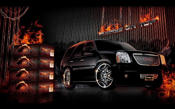 Black GMC SUV with flames and Diablo rims