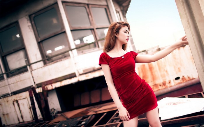 Stylish Woman in Red Dress Outdoors