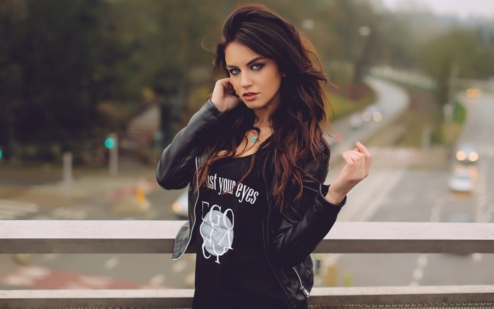 Aurela Skandaj wearing a leather jacket and t-shirt