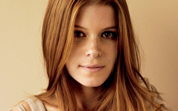 Close-up portrait of Kate Mara with auburn hair