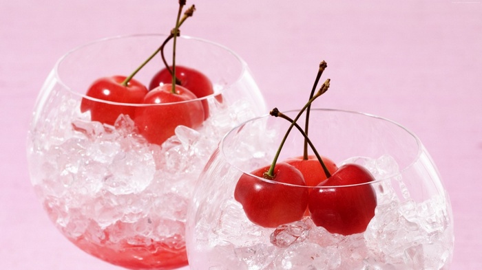 Cherries in ice-filled glasses