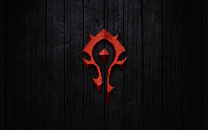 Horde logo from World of Warcraft on a wooden background