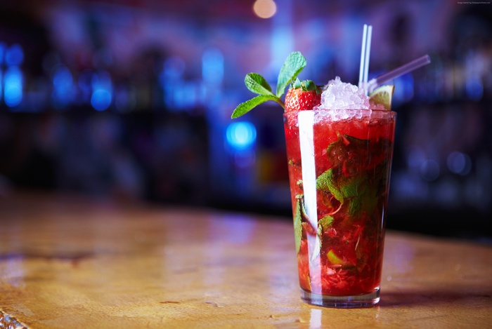 Strawberry Mojito cocktail with mint and ice