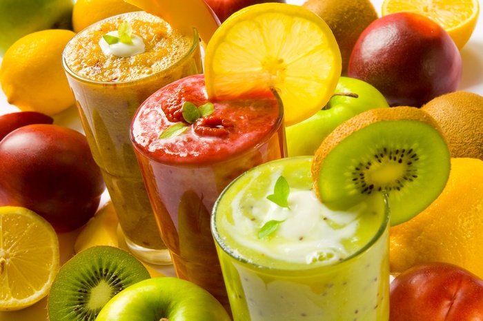 Assortment of fresh fruits and smoothies