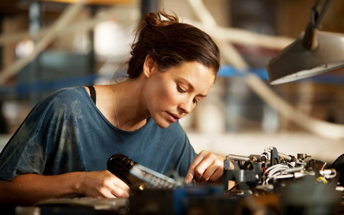Evangeline Lilly working on machinery