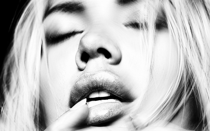 Monochrome close-up portrait of a woman's face