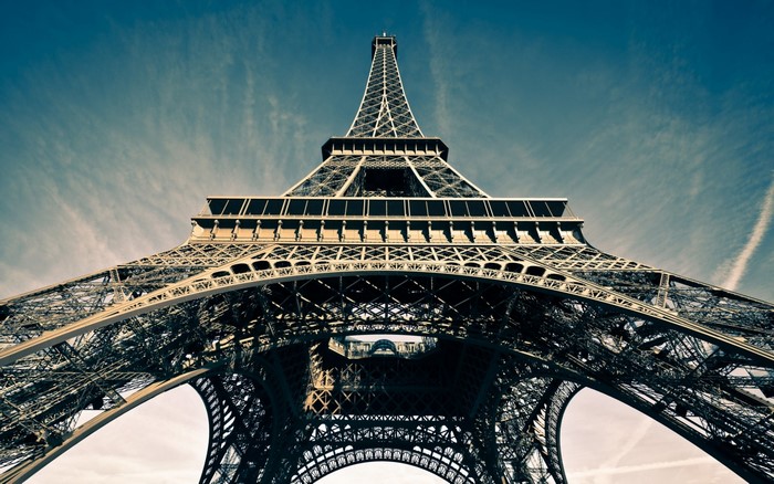 Eiffel Tower in Paris against a blue sky