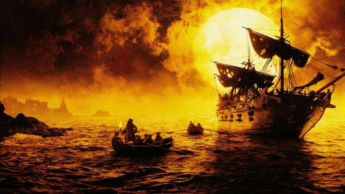 Ghost Ship sailing under a large moon