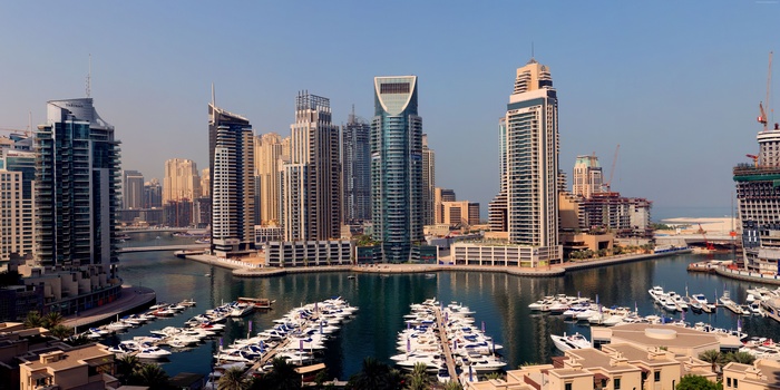 Dubai Marina skyscrapers and boats on the water