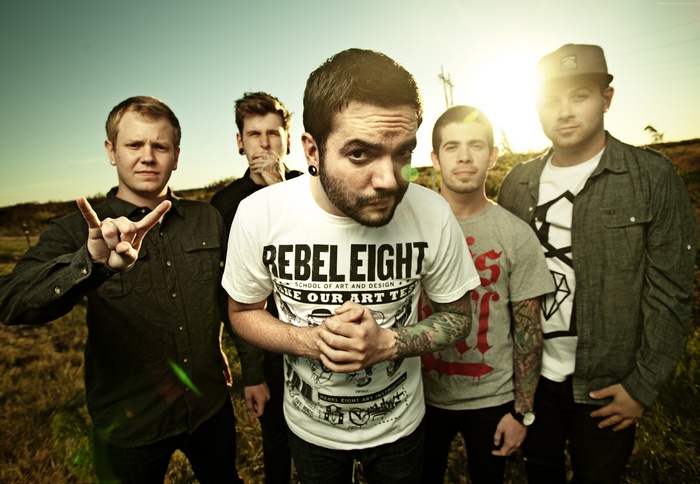 A Day to Remember band members posing outdoors