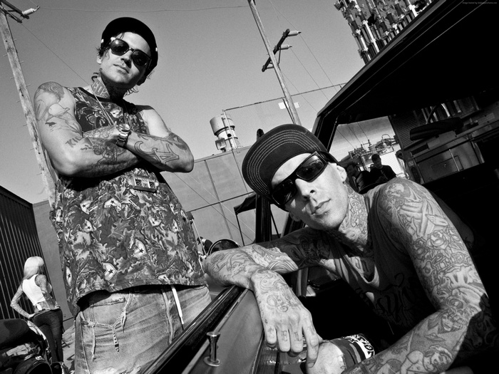 Travis Barker and friend with tattoos