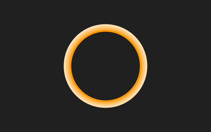Concentric orange rings on a dark background
