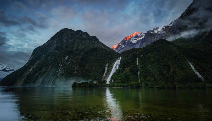 Mountains and waterfalls at sunset