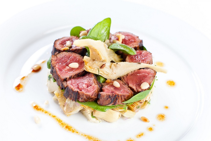 Beef salad with artichoke and pine nuts