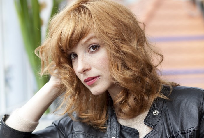Vica Kerekes portrait with freckles and red hair
