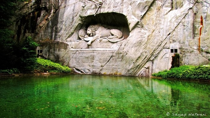 Lion of Lucerne Stone Sculpture by Reflective Pond