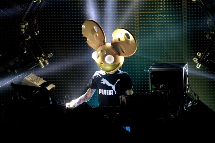 Deadmau5 performing on stage with Puma shirt