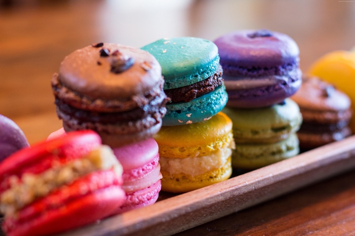 Colorful French Macarons on a Wooden Tray