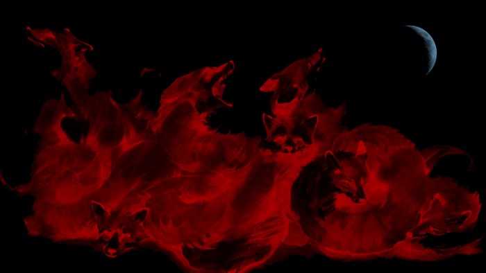 Red foxes in flames under the moon