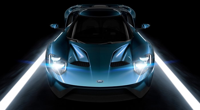 Ford GT sports car with headlights on