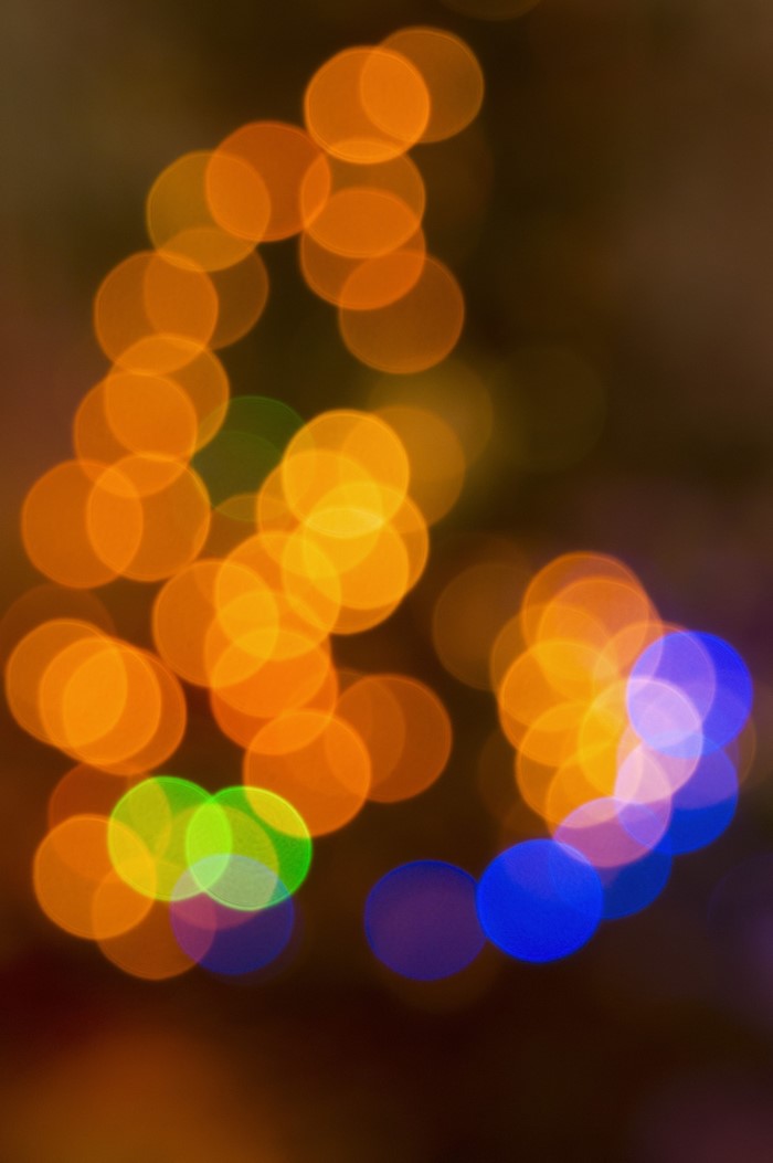 Bokeh lights in orange, green, and blue