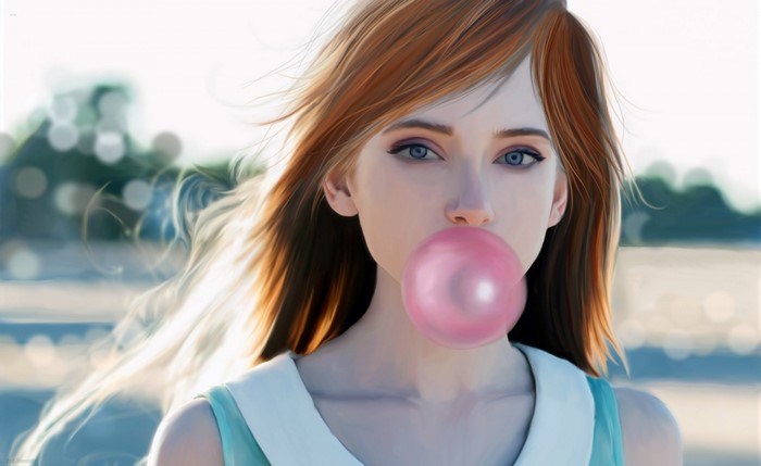 Young woman blowing pink bubblegum