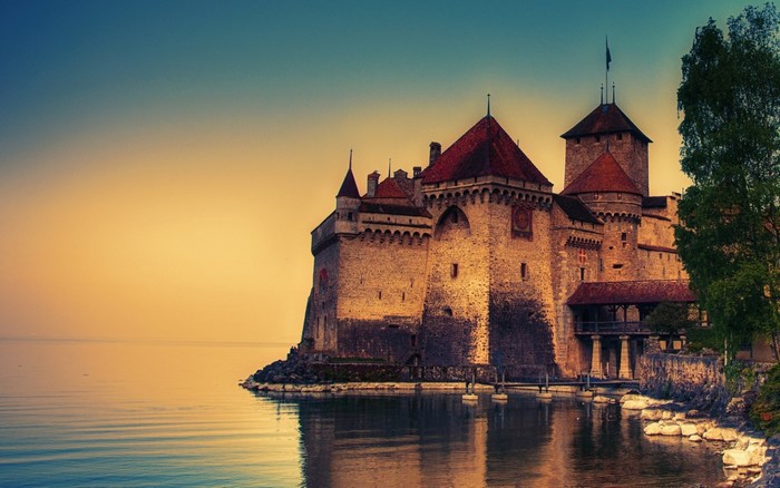 Chillon Castle on Lake Geneva at sunset