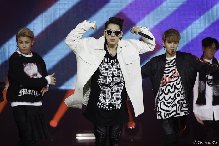 Block B members performing on stage