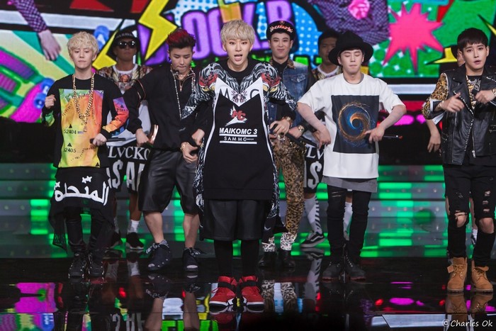Block B members performing on stage