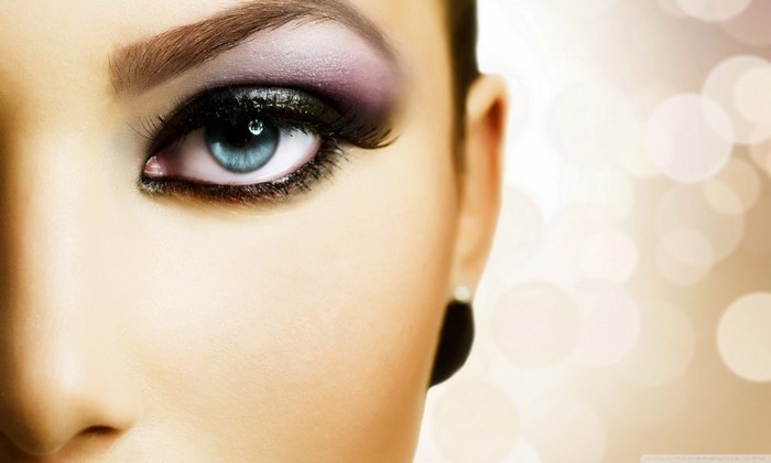 Close up of a woman's blue eye with makeup