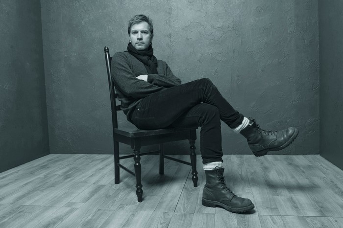Ewan McGregor sitting on a chair