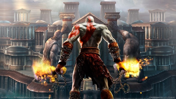 Kratos from God of War holding flaming blades