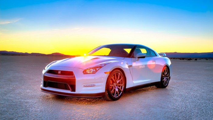 White Nissan GT-R sports car at sunset