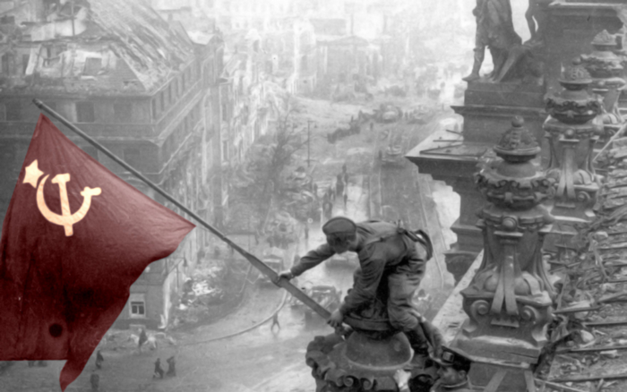 Soviet Soldier Raising Flag in Ruined Stalingrad