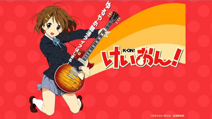 Yui Hirasawa from K-ON! playing guitar