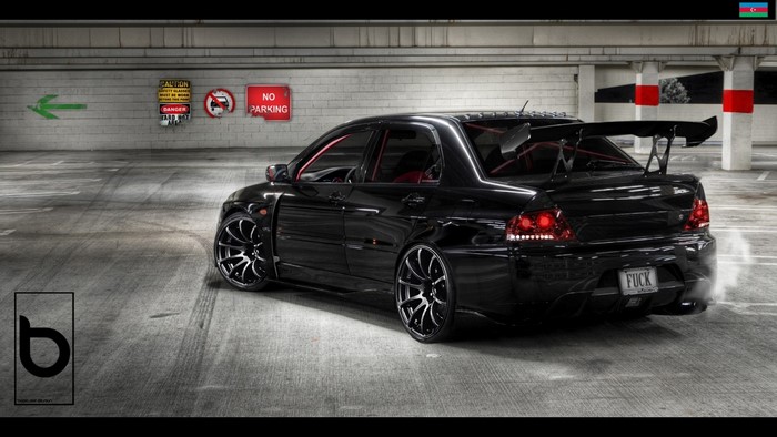 Black Mitsubishi Lancer Evolution with large spoiler
