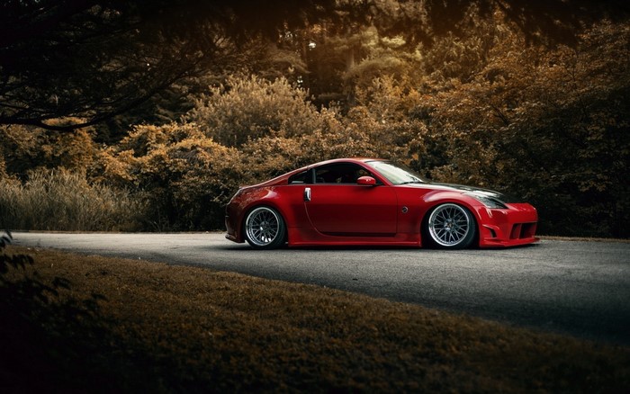 Red Nissan 350Z sports car on a road
