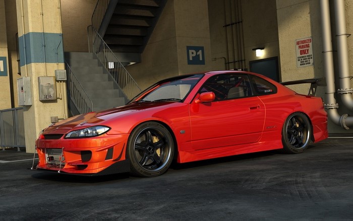 Red Nissan Silvia S15 sports car in parking garage