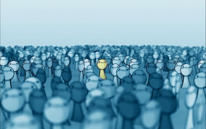 A yellow figure stands out in a crowd of blue figures
