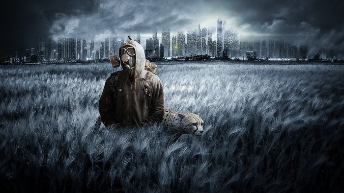 Man in gas mask with cheetah in field before city