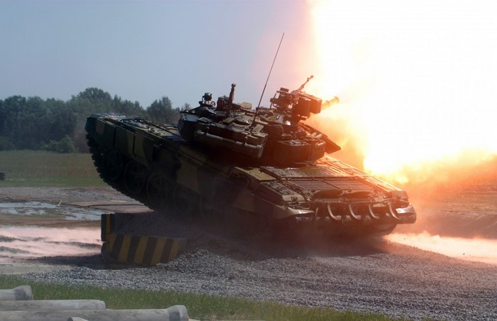 Tank firing a projectile with a large explosion