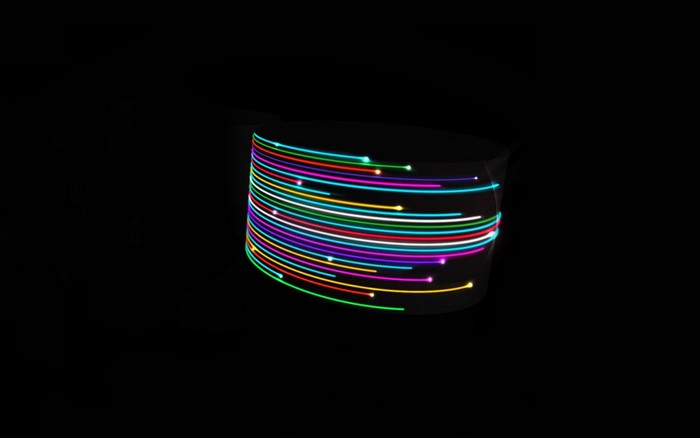 Abstract colorful light streaks on a black background