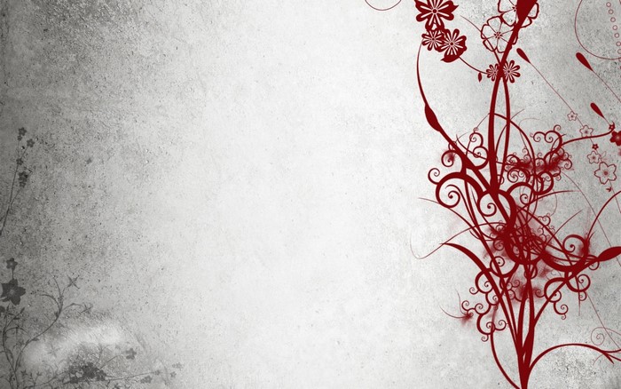 Red floral pattern on a textured grey background