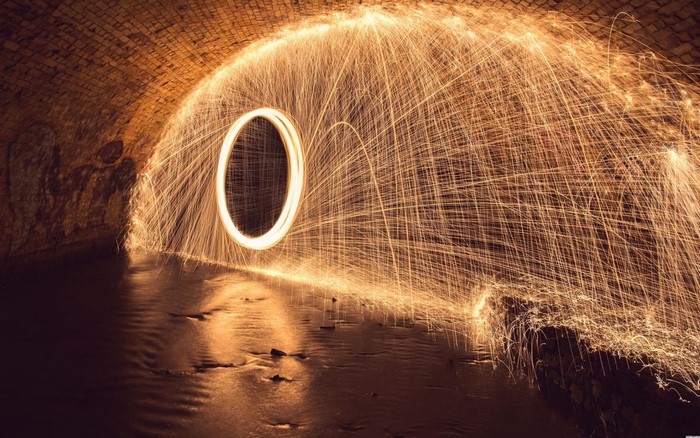 Steel wool light painting in a tunnel