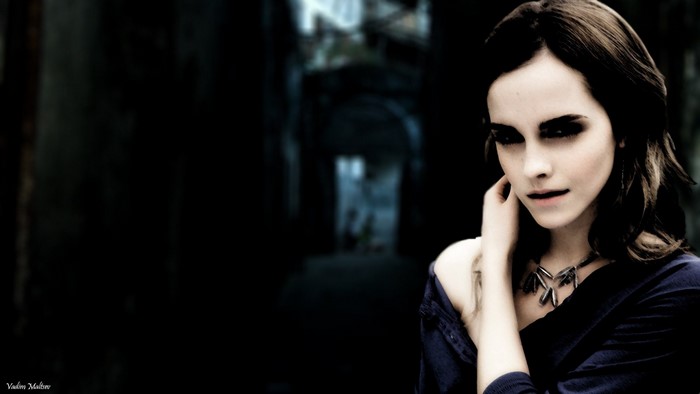 Emma Watson in dark makeup and necklace